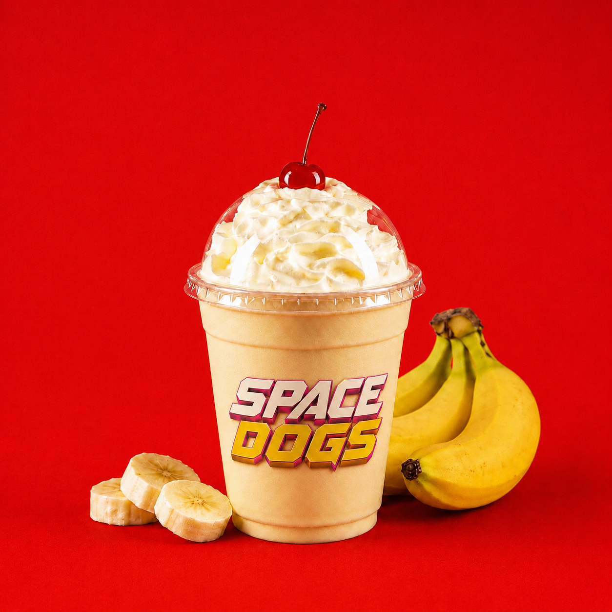 Space Dogs banana milkshake topped with whipped cream and a cherry